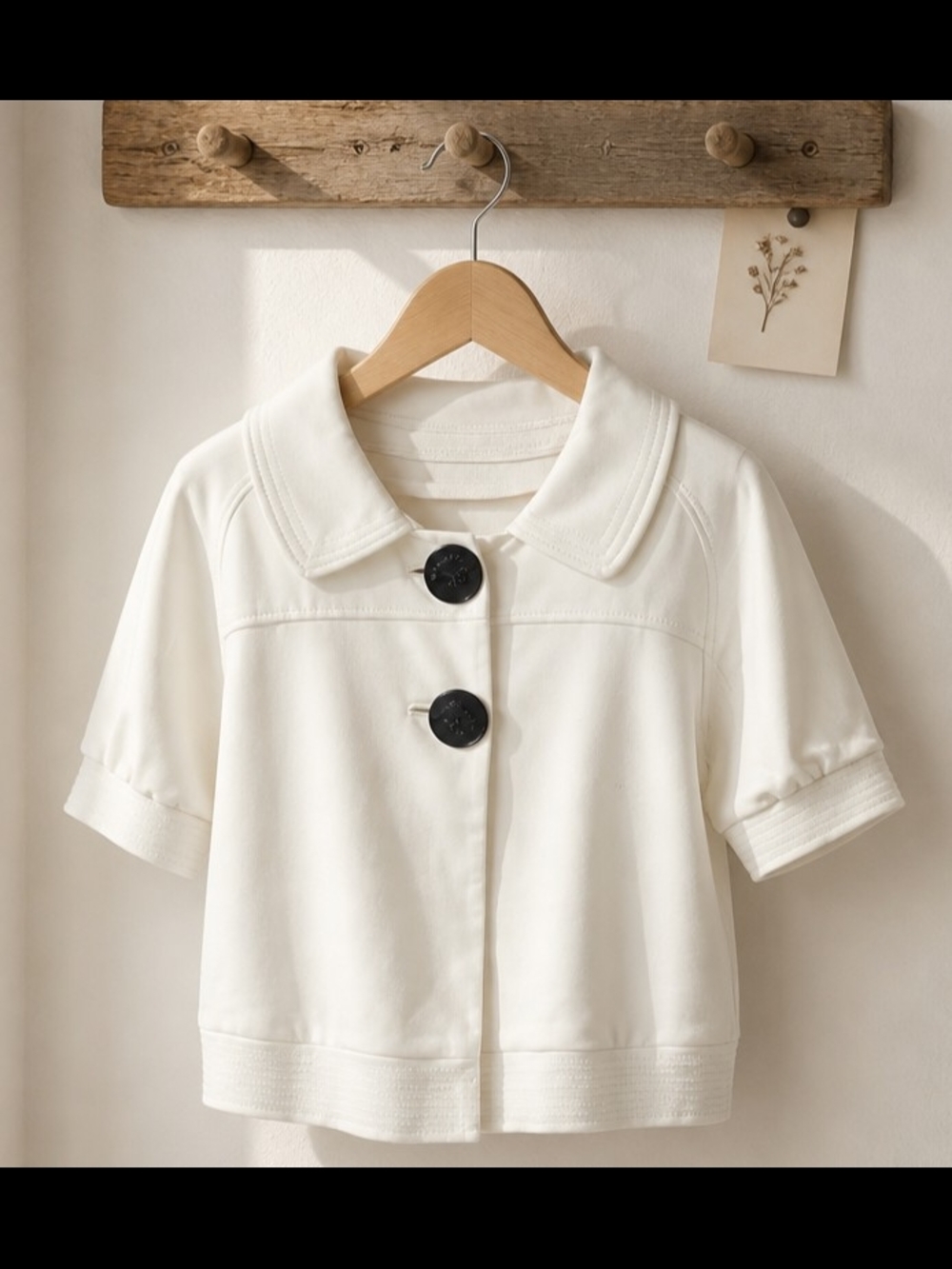 Essentials White Short-Sleeve Cropped Jacket with Black Metal Buttons